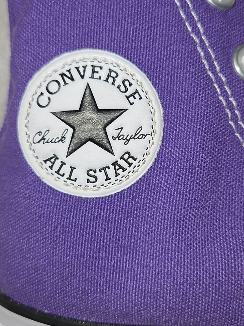 Converse Purple High Top Chuck Taylor All Star Sneakers